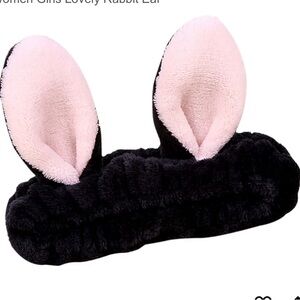Chic Black and Pink Bunny Ear Cosmetic Headband for keeping hair out of the way.